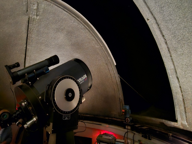 a powerful telescope inside an observatory at explora atacama