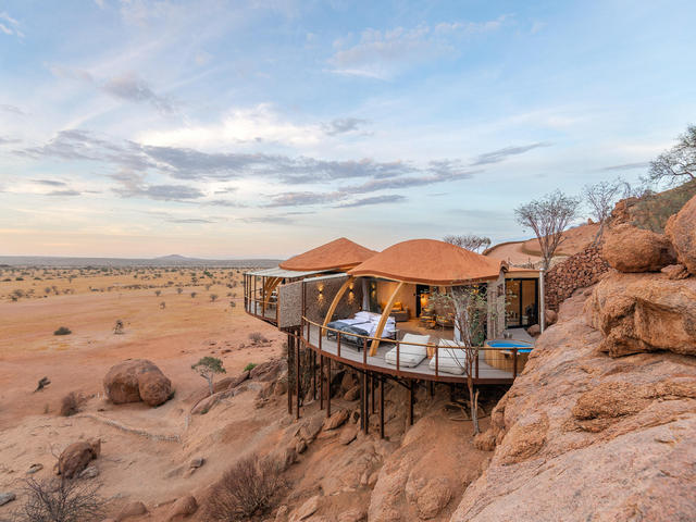 Guest chalet at Onduli Enclave, a private villa perched on rocks overlooking the desert landscapes of Damaraland, Namibia