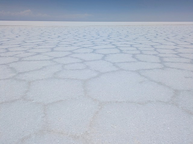 Hexagonal patterns and visible salt crystals on the uyuni SAlt Flats
