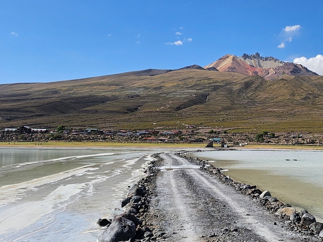 view of small village of colchani at the base of tunupa volcano