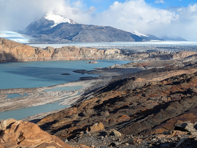 overlook of the toe of the receding upsala, with pools of water and recently deglaciated rocks