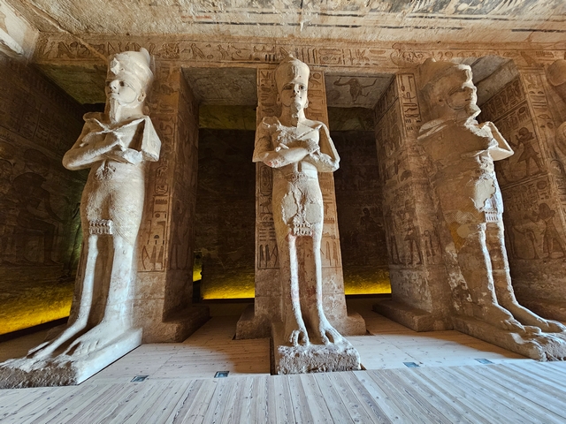 Three tall stone statues of Ramesses II represented as Osiris, found inside the great hall of the Great Temple of Abu Simbel.