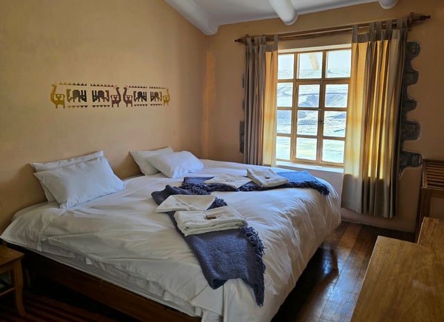 Simple room inside of Chillca Lodge.
